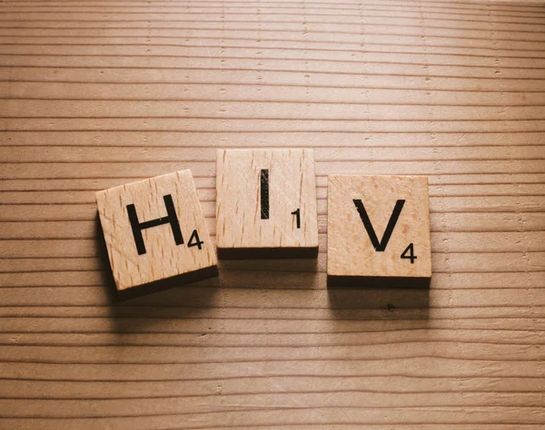 HIV word in scrabble letters - HIV word in Scrabble