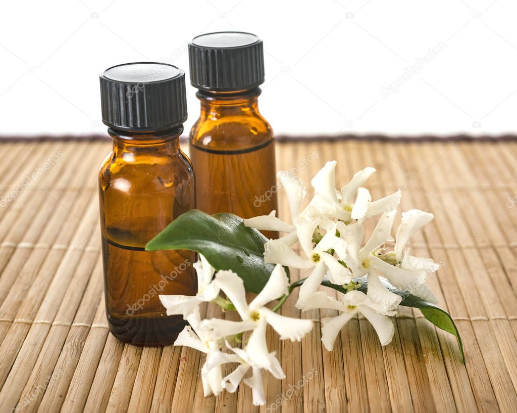 essential oils in front of white background