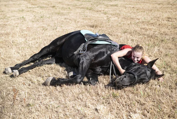 Riding girl and horse — Stock Photo, Image