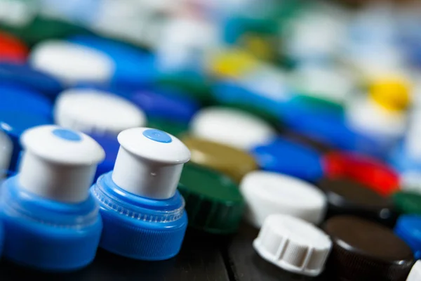 Collection of various colorful plastic screw caps — Stock Photo, Image