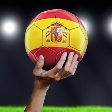 İspanyol bayrağı ile futbol topu tutan adam