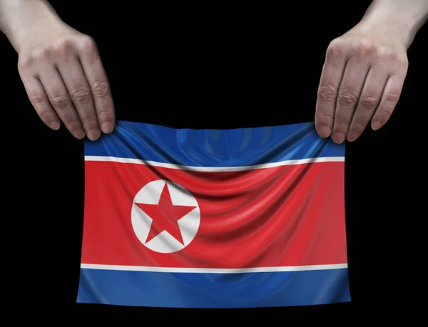 Bandera Corea Del Norte Manos — Foto de Stock