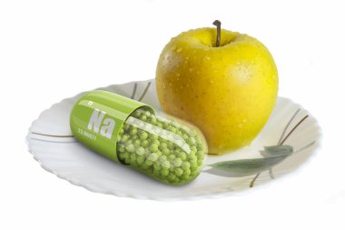 Beyaz bir plaka üzerinde sarı elma