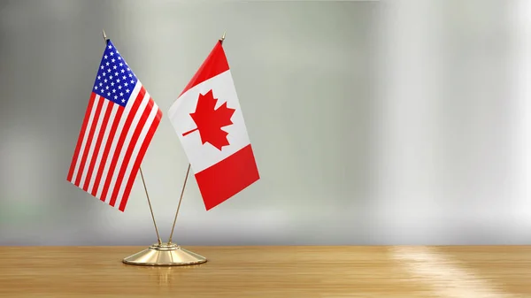 Pareja Bandera Estadounidense Canadiense Escritorio Sobre Fondo Desenfocado —  Fotos de Stock