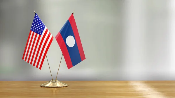 American Laos Flag Pair Desk Defocused Background — Stock Photo, Image