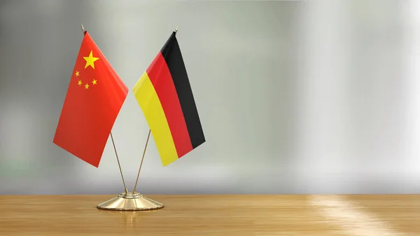 Chinese German Flag Pair Desk Defocused Background — Stock Photo, Image