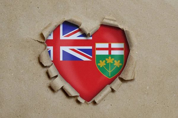 Herzförmiges Loch Durch Papier Gerissen Zeigt Flagge Von Ontario — Stockfoto