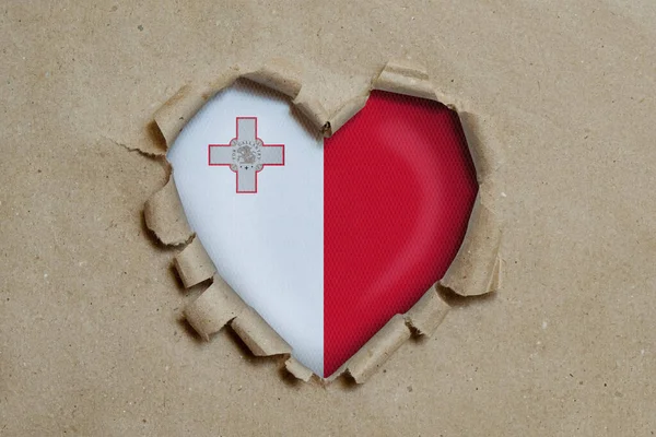 Heart Shaped Hole Torn Paper Showing Malta Flag — Stock Photo, Image