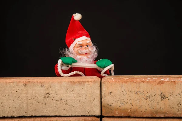 Santa Trying Climb Wall Immigration Concept — Stock Photo, Image