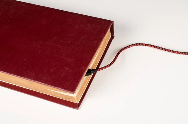 Old Book Battery Charging Cable White Background — Stock Photo, Image