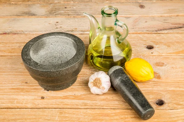 Mortar and pestle with alioli ingredients — Stock Photo, Image