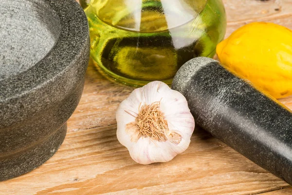 Mortar and pestle with alioli ingredients — Stock Photo, Image