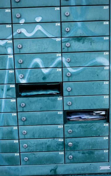 Full frame take of weathered mailboxes