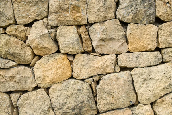 Old Masonry Wall Irregularly Sized Stones Stock Photo