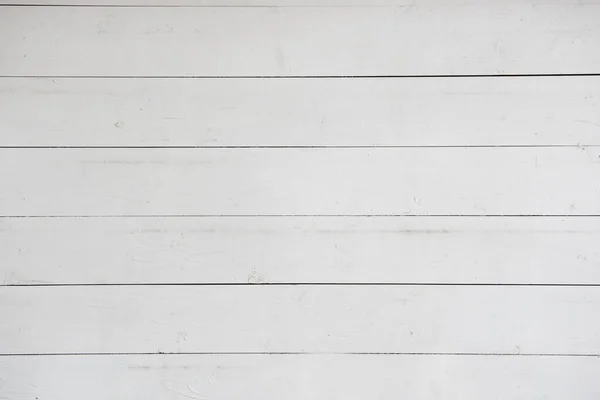 Wall of white wooden planks. Background of wooden planks.