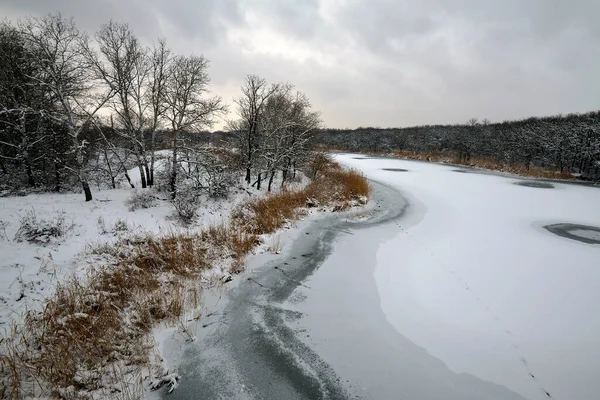 Winter landscape of the river banks, Samara river in Ukraine, the left tributary of the Dnieper.