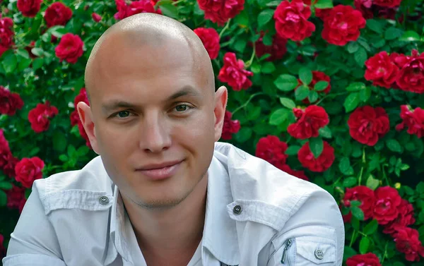 Young Man Background Beautiful Flowers — Stock Photo, Image