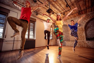 Group of professional dancer training modern dances in studio clipart