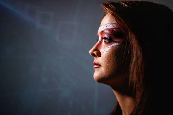 Indian female with colorful ceremonial make up