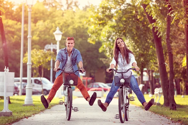 Happy Autumn Funny Couple Riding Bicycle — Stock Photo, Image