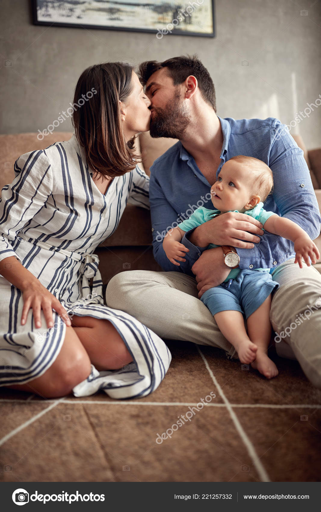 Happy Mother Father Holding Cute Baby Boy Kissing Home Stock Photo ...