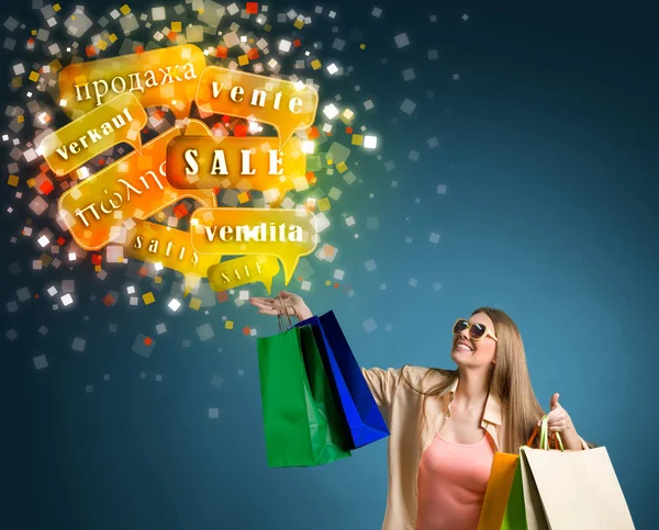 Smiling Woman Shopping Sale Words International — Stock Photo, Image