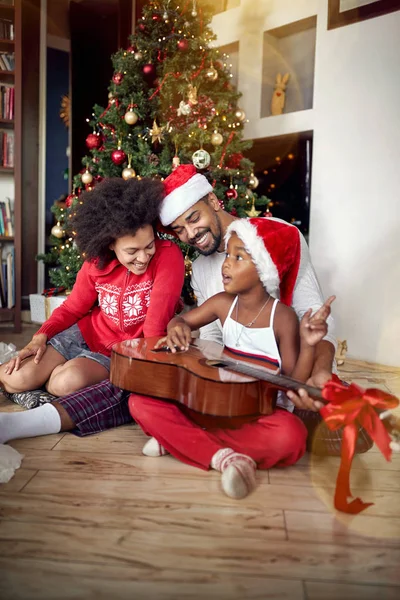 Happy Family Playing Guitar Songs Front Decorated Christmas Tree Home — Stock Photo, Image