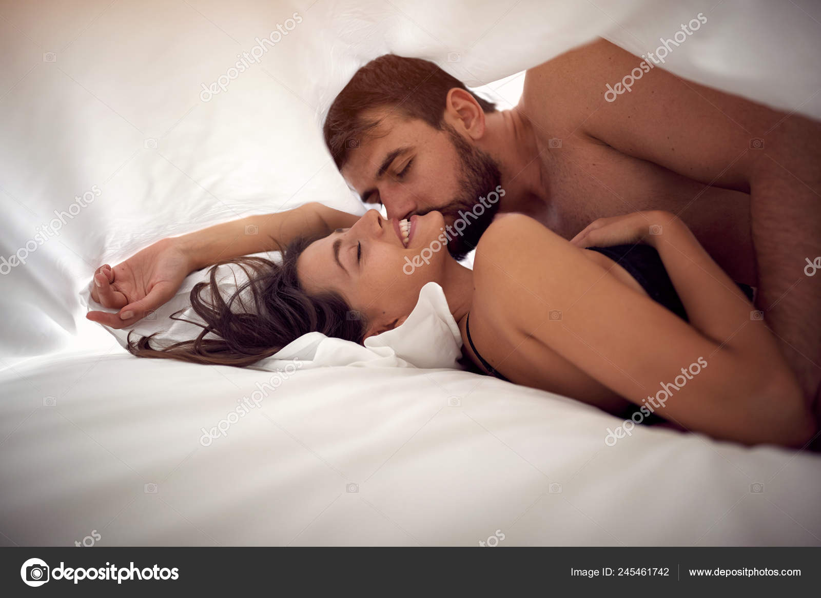 Young Loving Man Woman Making Love Bed Passionate Sex Stock Photo by ©luckybusiness 245461742 image
