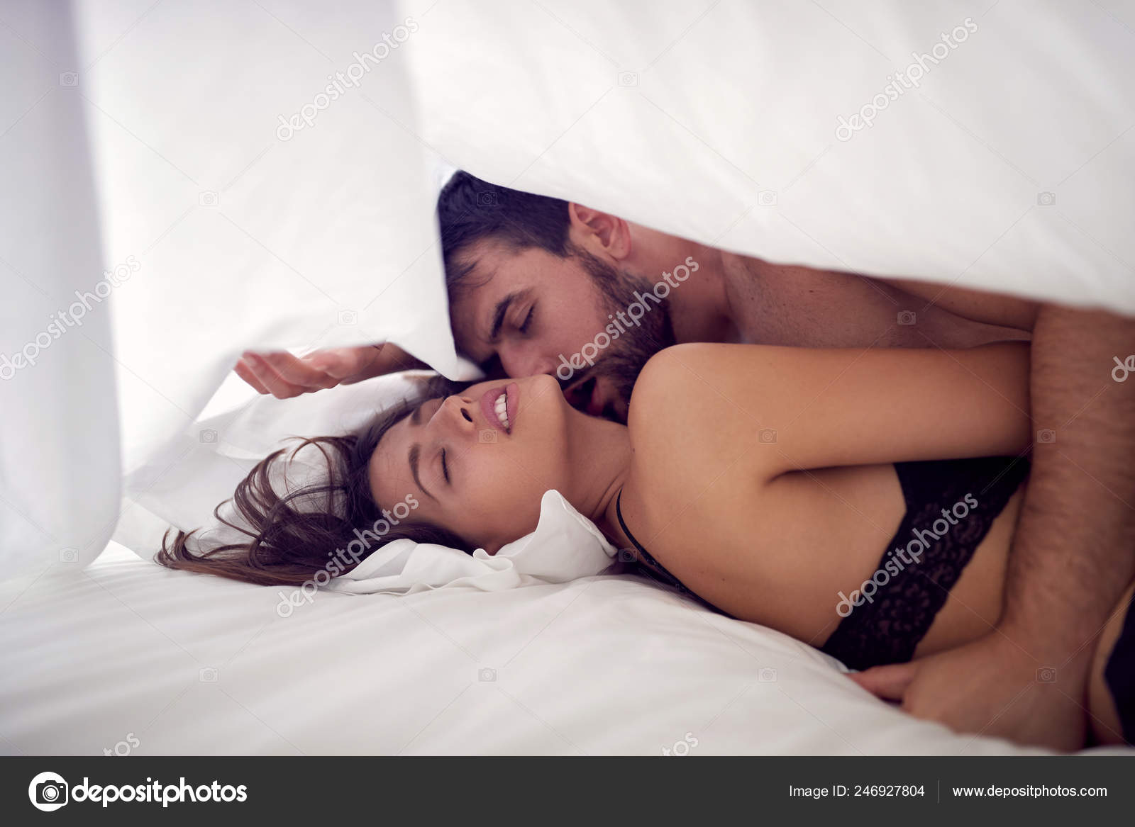 Young Lovers Man Woman Making Love Bed Passionate Sex Stock Photo by ©luckybusiness 246927804 pic image