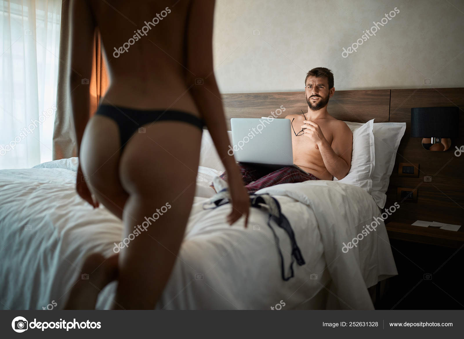 Girl in underwear seduces business men Stock Photo by ©luckybusiness 252631328