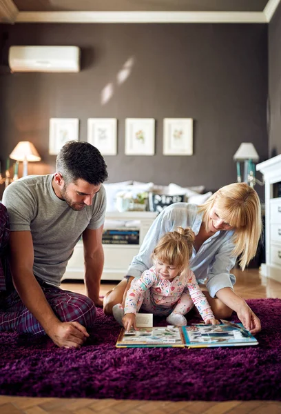 Child with parents having fun — Stock Photo, Image