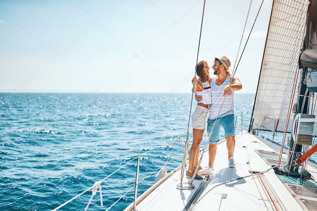Man and woman in love - Romance on a sailboat