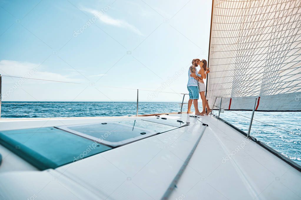 lovers traveling on vacation sailing on open sea ocean enjoying 