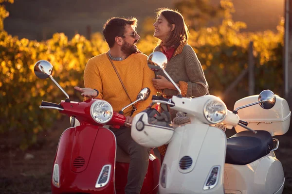 Couple on scooter enjoying in romantic road trip — Stock Photo, Image