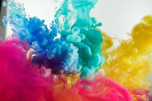 Ink rainbow color splash in water — Stock Photo, Image