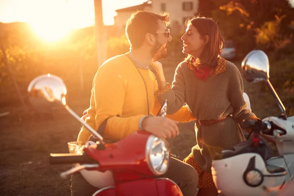 Happy tourists on scooter enjoying in romantic road trip on vacation — Stock Photo, Image