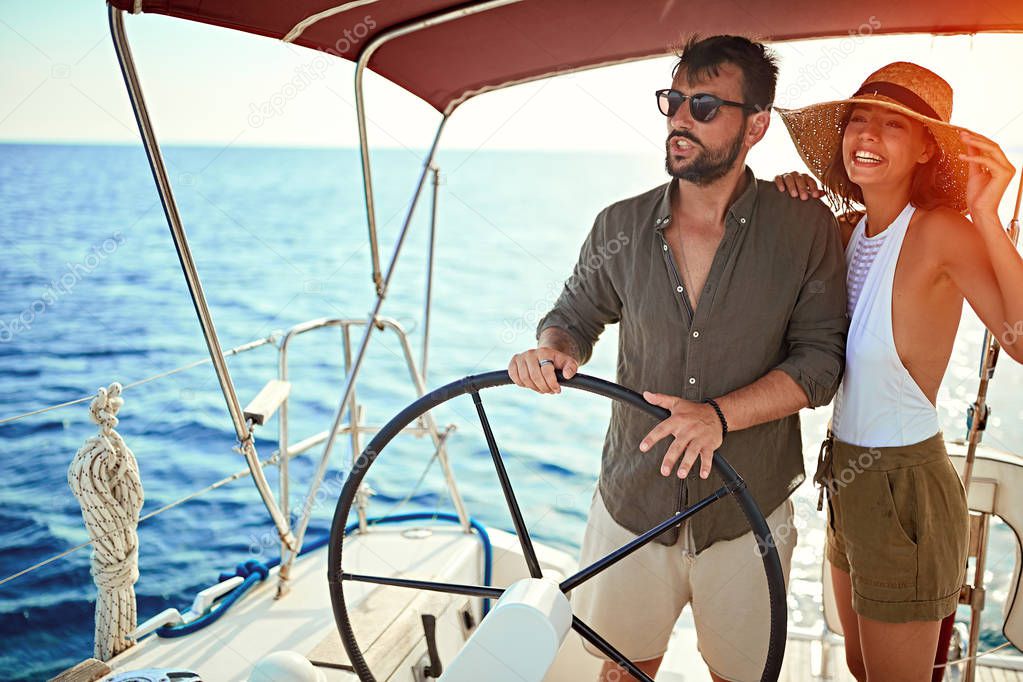 Romantic couple on boat enjoy at vacation