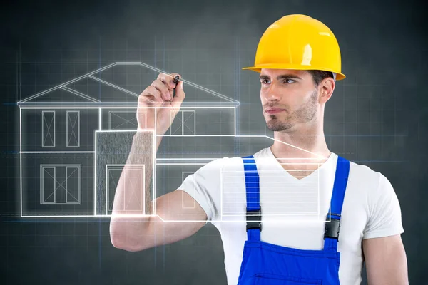 Engineer drawing a plan for a house — Stock Photo, Image
