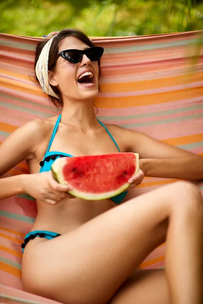 Cheerful girl enjoying in hammock — Stock Photo, Image