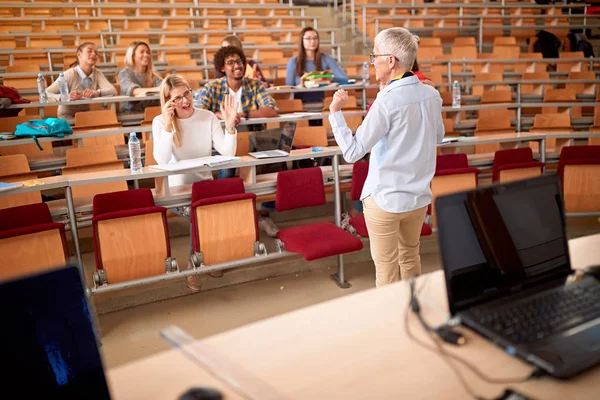 University students listening to teacher in the classroom on college — Stock Photo, Image