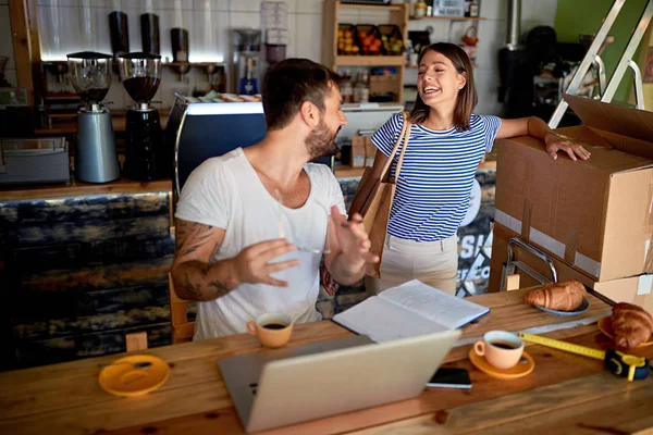 Man and woman as business partners. Young business owner working — Stock Photo, Image