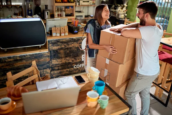 Business owner couple working to open their cafe — Stock Photo, Image