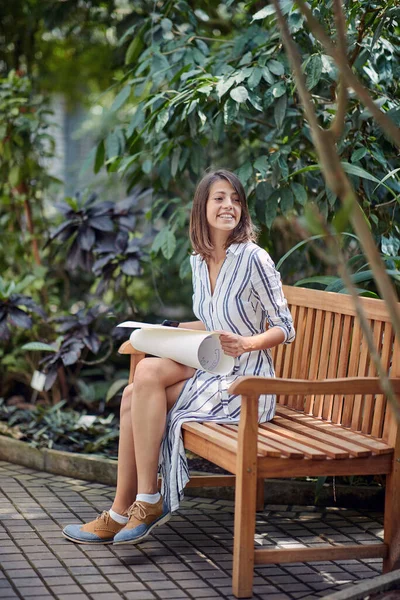 Young Caucasian Female Sitting Wooden Bench Nature Holding Plan Paper — Stock Photo, Image