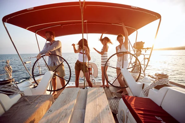 stock image Party the boat at the sunset.Happy Friends have fun at vacation.