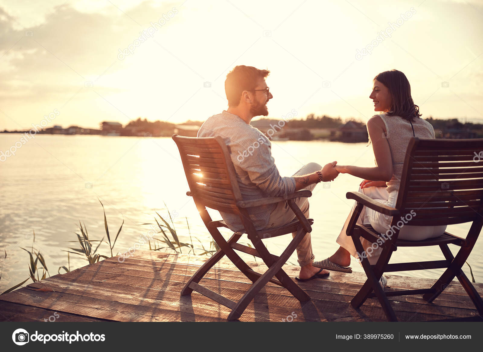 Romantic Caucasian Couple Sitting Chairs River Holding Hands