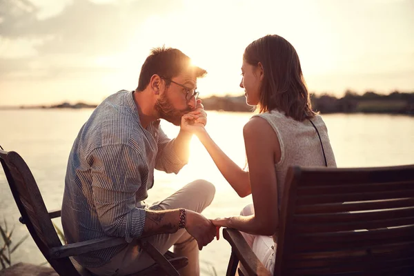 Young Beardy Man Holding Kissing Hand Woman River Sunset — Stock Photo, Image