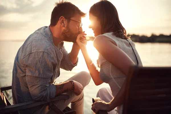 Close Young Beardy Man Holding Kissing Hand Woman River Sunset — Stock Photo, Image