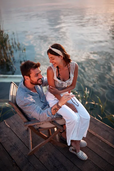 Top View Beautiful Woman Sitting Lap Man Water Talking Smiling — стоковое фото