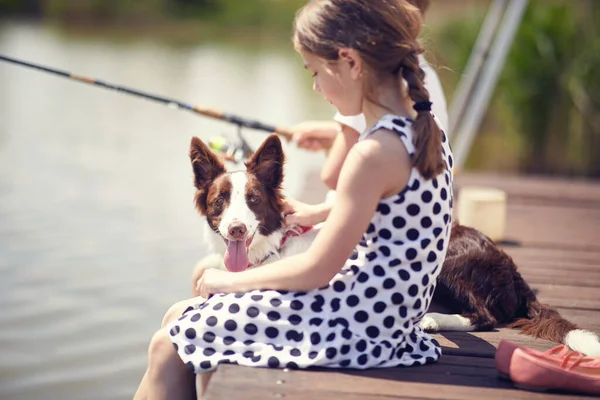 Little Girl Sitting Wood Pier Enjoying Her Dog — Stock Photo, Image