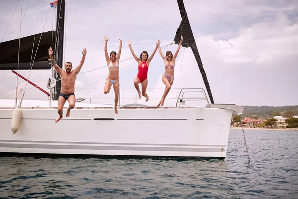 Friends Taking Funny Jumps Yacht Sunny Day — Stock Photo, Image